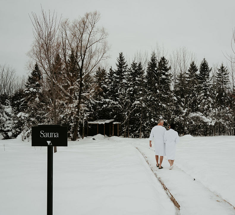 Couple Walking To Sauna Winter