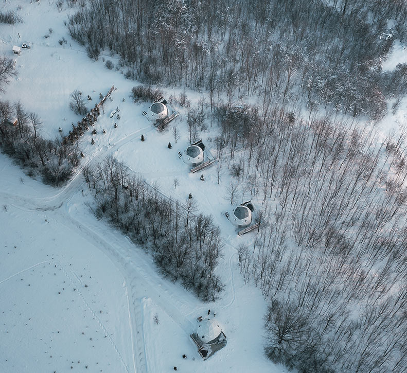 Drone Shot Forest Domes+1 Meadow Dome-Winter